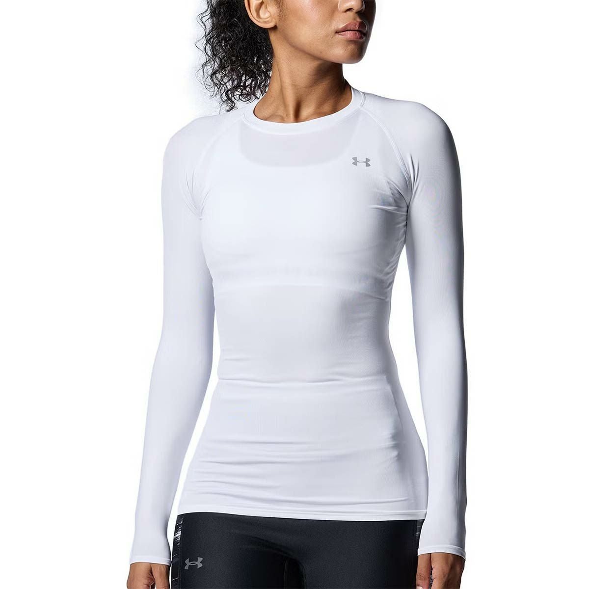 アンダーアーマーUNDERARMOURジムフィットネスヨガウェアインナーシャツアンダーシャツヒートギアコンプレッションクルーシャツHGCompressionLSCrew1358604-100レディース女性25FA秋冬